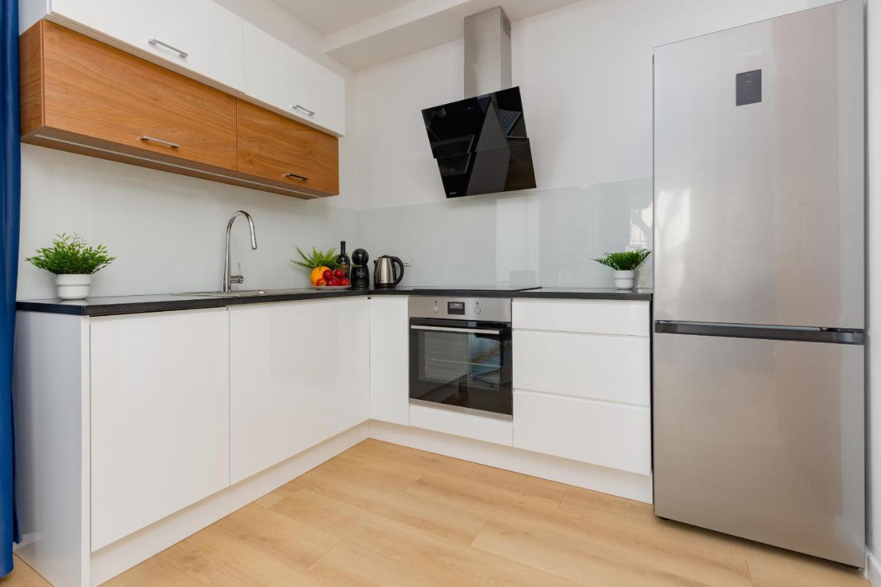 Warszawa Srodmiescie Bonifraterska Apartments By Noclegi Renters Bagian luar foto